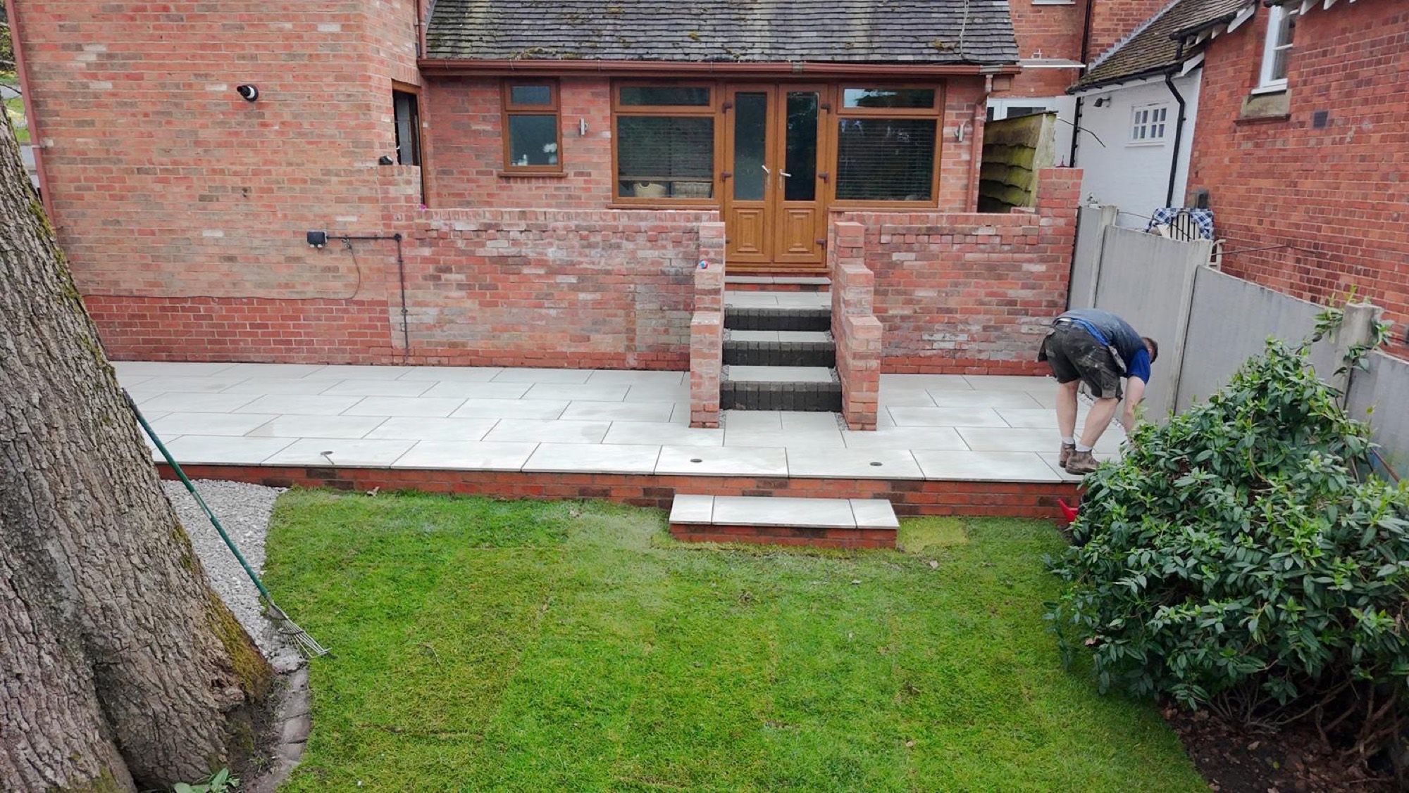 A completed landscaping and paving project by Trio Construction Group